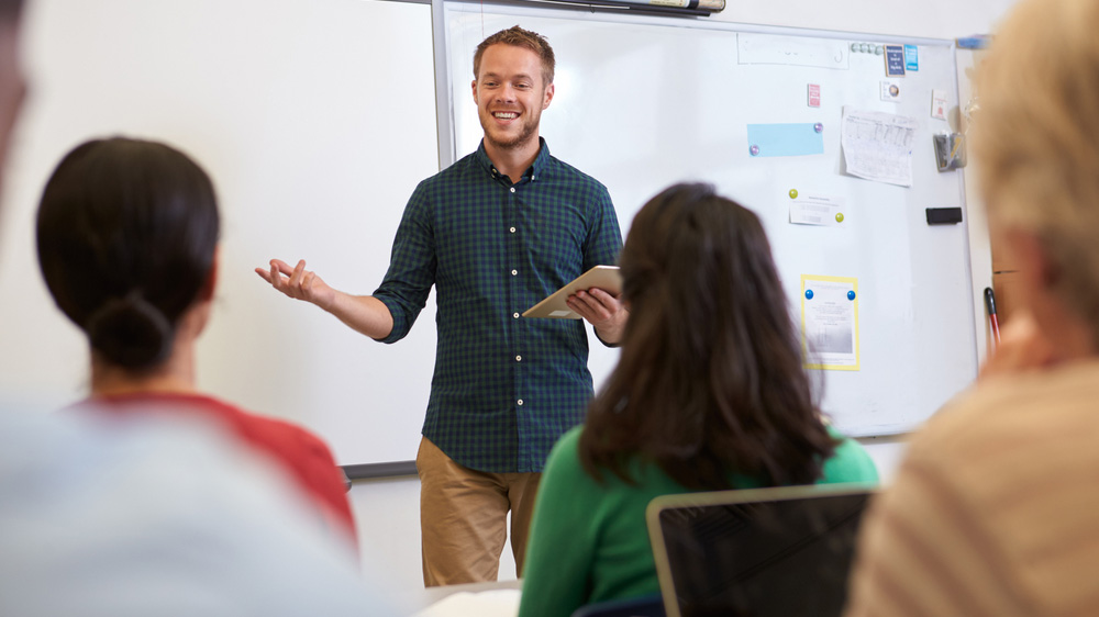 A professor in a classroom.